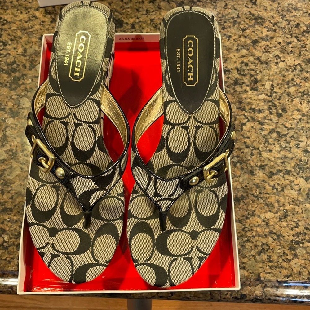 Coach black and gray signature wedges with buckle.